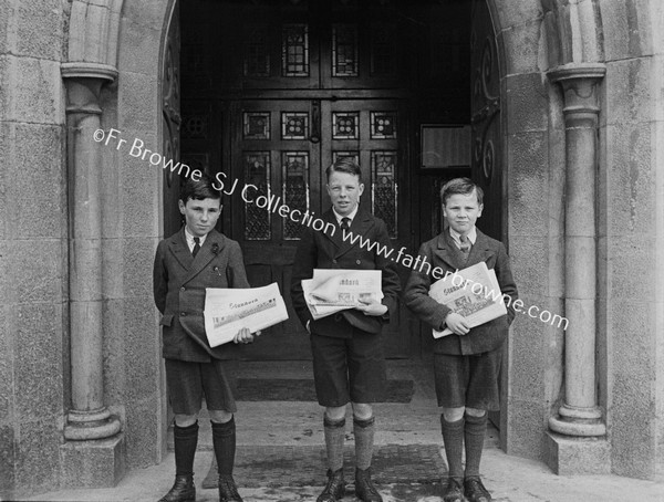 BOYS WITH STANDARD NEWSPAPER